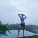 Kavya Keeran Instagram – I always put 2 alrams ⏰️ 
1st one for the person I want to be 😇
and 2nd one for the person I am 🙄😎
.
.
.
.
#balivibes #bali #lifestyle #sunset #clouds #sky #peace #igviral #igdaily #glamlove #pooltime #greenery #hotpants #explorepage #trending #trendingaudio #zenzone #serenity #sunkissed #goldenohour #instagood #beingme @Instagram #kavyakeeran