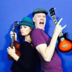 Keegan Connor Tracy Instagram - #throwback to being a rock star with the legendary @kenlawsonsauce for the fundraiser which made enough to buy a full set of ukuleles for my kids’ elementary school music program. Still one of my proudest achievements 🖤🎵#ukecandoit #musicmatters