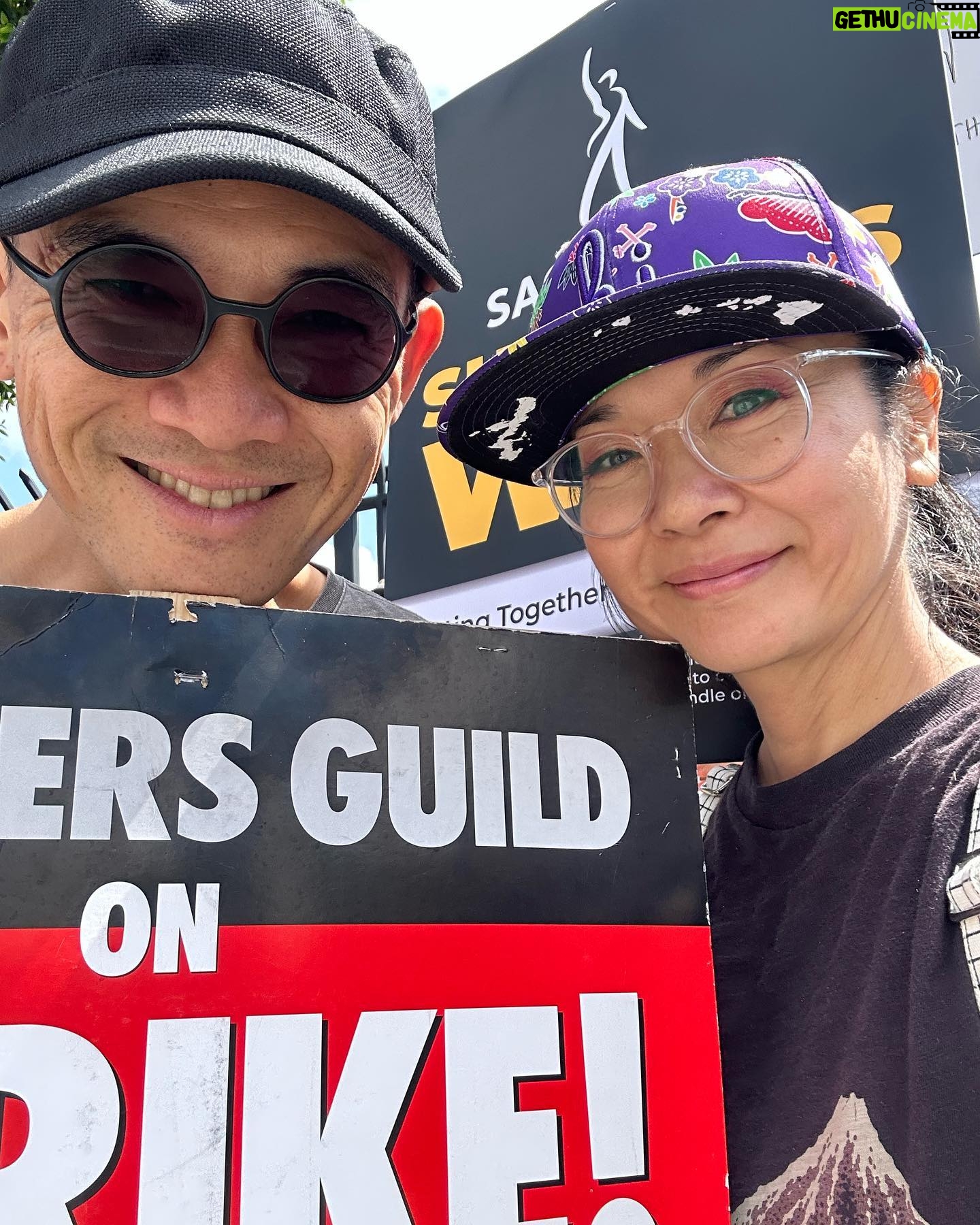 Keiko Agena - 4.4K Likes - Out at the picket line today at Universal Studio. Wish we could credit the writer that wrote that sign! So many great signs out at the picket line today. @shinkawasaki and I support the writers.
Fair Wage. Union Strong.
#WGAstrong, #sagaftramember and #1u