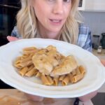 Kelly Kruger Instagram - MARRY ME CHICKEN!! I’ve modified this recipe making it gluten free with coconut milk instead of cream. Apparently anyone u make this for will want to marry you so hot tip for Valentine’s Day dinner!!! Have you tried this yet?? Would you? MAKE IT: - 4 boneless, skinless chicken breasts - Salt and pepper to taste - 2 tablespoons olive oil - 3 cloves garlic, minced - 1 teaspoon red pepper flakes (adjust to taste) - 1 cup chicken broth - 1 can (13.5 oz) coconut milk - 1 tablespoon gluten-free flour (such as almond flour or a gluten-free all-purpose flour blend) - 1 teaspoon Italian seasoning - 1 cup grated Parmesan cheese - 1/2 cup sun-dried tomatoes, chopped - Fresh parsley, chopped, for garnish Instructions: 1. Preheat your oven to 375°F (190°C). 2. Season the chicken breasts with salt and pepper on both sides. 3. In a large oven-safe skillet, heat the olive oil over medium-high heat. Add the chicken and cook for 4-5 minutes on each side, until golden brown. Remove the chicken from the skillet and set aside. 4. In the same skillet, add the minced garlic and red pepper flakes. Sauté for about 1 minute until fragrant. 5. In a small bowl, whisk together the chicken broth, coconut milk, and gluten-free flour until well combined. 6. Pour the coconut milk mixture into the skillet. Add the Italian seasoning and chopped sun-dried tomatoes, then stir to combine. Allow the mixture to come to a simmer. 7. Return the chicken to the skillet, spooning some of the sauce over the top of each piece. Sprinkle the grated Parmesan cheese over the chicken. 8. Transfer the skillet to the preheated oven and bake for 25-30 minutes, or until the chicken is cooked through and the sauce is bubbling. 9. Once done, remove the skillet from the oven. Garnish the chicken with chopped fresh parsley before serving. #Dinneridea #eaymeals #chicken #whatsfordinner #recipeshare #recipe #glutenfree #coconutmilk