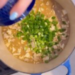 Kelly Kruger Instagram – I can’t believe I’ve never had this before!!! Well I guess I can, most Mapu Tofu is made with pork and I don’t eat pork but I made it with ground turkey and this was chefs kiss!!!! 💋 👩🏻‍🍳 SOOOO GOOD!!!! I had it with rice for dinner and the next day over kelp noodles for lunch and I’m salivating right now even writing about it. 

As always, gluten free with no refined sugar. 

Have u tried this dish or made it? Would you? What’s your favorite type of cuisine? 

Here’s how to make it: 
– 1 block (14 oz) firm tofu, cut into small cubes
– 1/2 lb ground turkey
– 1 tablespoon fresh ginger, minced
– 3 cloves garlic, minced
– 2 tablespoons miso paste I used half cup 
– 2 tablespoons soy sauce
– 1 tablespoon maple syrup
– 3-4 green onions, chopped (for garnish)
– 2 tablespoons olive oil or avocado oil for cooking

Instructions:
1. Heat the olive oil or avocado oil in a large skillet or wok over medium heat.
2. Add the ground turkey to the skillet and cook until browned, breaking it apart with a spoon as it cooks.
3. Once the turkey is cooked, add the minced ginger and garlic to the skillet and cook for about 1 minute, until fragrant.
4. Add the miso paste, soy sauce, and maple syrup to a bowl and stir together then add it to combine with the turkey, ginger, and garlic.
5. Carefully add the cubed tofu to the skillet and gently stir to combine with the turkey mixture, being careful not to break the tofu cubes.
6. Let the Mapo Tofu simmer for about 5-7 minutes, allowing the flavors to meld and the tofu to heat through.
7. Once the dish is ready, garnish with chopped green onions.
8. Serve the Mapo Tofu hot over steamed rice or with kelp noodles for a gluten-free option.

#recipeshare #tofu #glutenfree #refinedsugarfree #easyrecipes
