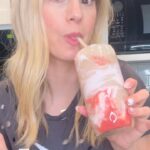 Kelly Kruger Instagram – Here!! 👇🏻👇🏻👇🏻

My absolute favorite smoothie to get when I’m out is the @erewhon @haileybieber smoothie. It’s sooo good and so good for you! (Hair skin and nails particularly. I had to try recreating it and I was actually really proud at the result!’

Would you make this smoothie at home or would you rather buy one? 

What kind of smoothies do you typically like? 

Ingredients:
– 1 ripe banana
– 1 cup strawberries (fresh or frozen)
– 1/2 avocado
– 1 cup almond milk
– 1 tablespoon collagen powder
– 1 tablespoon maple syrup (or to taste)
– 2-3 pitted dates
– 1 scoop protein powder (optional)
– 1 teaspoon sea moss (optional)
– For glass decoration: strawberry glaze, coco whip

Instructions:
1. In a blender, combine the banana, strawberries, avocado, almond milk, collagen powder, maple syrup, dates, protein powder, and sea moss.
2. Blend until smooth and creamy. Add more almond milk if needed to reach your desired consistency.
3. In a separate bowl, mix the strawberry glaze.
4. Pour the strawberry glaze into the bottom of the serving glass.
5. Add a layer of coco whip on top of the strawberry glaze.
6. Pour the smoothie mixture into the glass.
7. Top with more coco whip.
8. Optionally, you can garnish with additional strawberries or other toppings.

#strawberry #smoothie #haileybieber #smoothierecipe #recipeshare #highprotein #healthyfood #skinfood