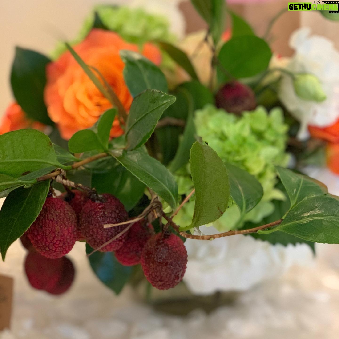 Kelly Preston Instagram - Two of my favorites... fresh flowers and lychee fruit!! I love summer!