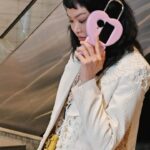 Kelly Tandiono Instagram – Lights, camera, action… and selfies! @kelly_tandiono elevates her night to remember with @oppo x @ambush_official Flipped Padlock for Oppo Find N3 Flip before the gala dinner 💖! (Editor: @michelleothman / Videographer: @ferdianrus edited by @godzylla_)

#BazaarIndonesiaICONSCharityGala  #BazaarIconsParty #OppoBazaarIconsCharityGala2023 #BazaarIndonesiaxGelangHarapan @oppoindonesia