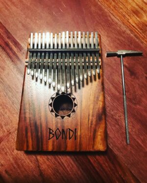 Kestie Morassi Instagram - Well after a long, emotionally draining and productive day I crawled back to my dressing room only to lay eyes on this curious little instrument sent to me from my old pals at @bondiukuleles - I have zero idea what a “Kalimba” is, but my gad it’s pretty and I can’t wait to get properly acquainted with it. Thank you so much for this entirely unexpected, “for no particular reason just coz” gift. So special. 🖤 @bondiukuleles bibs