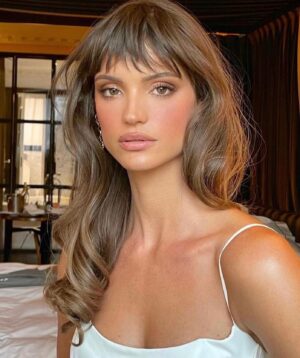 Kim Suzanne Engelbrecht Instagram - To know her is to love her . 🕊 RIP 
You were immediately struck by her undeniable beauty then disarmed by her genuine charm and grace. 
She was fiercely hard working , witty and oh so cool ! 
The coolest ❤️ 
You inspired us Charlbi 
Your most recent film achieved Global acclaim yet you remained ever humble and unassuming about your successes 

Our South African gem 💎 
You lit up the world ❤️ 

 
My thoughts are with her friends and family and her beloved fiancé . 
Rest Easy Princess 🕊

She Was a Phantom of Delight
BY WILLIAM WORDSWORTH
She was a Phantom of delight 
When first she gleamed upon my sight; 
A lovely Apparition, sent 
To be a moment's ornament; 
Her eyes as stars of Twilight fair; 
Like Twilight's, too, her dusky hair; 
But all things else about her drawn 
From May-time and the cheerful Dawn; 
A dancing Shape, an Image gay, 
To haunt, to startle, and way-lay. 
I saw her upon nearer view, 
A Spirit, yet a Woman too! 
Her household motions light and free, 
And steps of virgin-liberty; 
A countenance in which did meet 
Sweet records, promises as sweet; 
A Creature not too bright or good 
For human nature's daily food; 
For transient sorrows, simple wiles, 
Praise, blame, love, kisses, tears, and smiles. 
And now I see with eye serene 
The very pulse of the machine; 
A Being breathing thoughtful breath, 
A Traveller between life and death; 
The reason firm, the temperate will, 
Endurance, foresight, strength, and skill; 
A perfect Woman, nobly planned, 
To warn, to comfort, and command; 
And yet a Spirit still, and bright 
With something of angelic light.