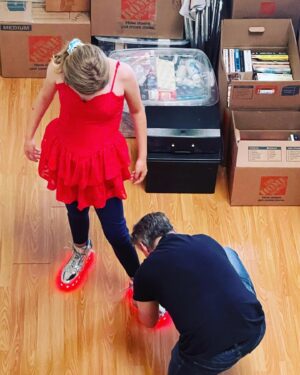 Kim Rhodes Instagram - Why, when my husband is so handsome, so camera savvy, is this his birthday photo? Because you don’t understand. 

Boxes of our stuff, packed for a move that he was doing because it was best for his family. Tying shoes for his daughter to wear to middle school prom because the shoes were perfect, but the laces still escape her defiant fingers. Photo taken from overhead because wife had gotten a face full of Covid and was waiting it out. 

You don’t understand the gift Travis Hodges is to this world. His patient persistence. His eager learning. His kind joy. His ability to keep us safe from the wolves of modern day better than any trained warrior. He is the most magnificent human, parent and partner. I wish I were there to celebrate him. 

Please drop him a note. Happy Birthday, beloved.