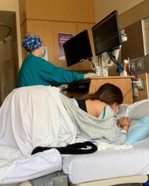 Kimberly Daugherty Instagram - A year ago today, I was in the middle of labor and FaceTiming my husband. They induced me early due to #preeclampsia and @brantdaugherty was still in Canada. Due to quarantine rules he couldn’t leave. Thank goodness I had my sister @astylepixie and mom with me. Oh, and my bff @ashleytisdale was in labor down the hall with @cmfrench. It took 32 hours of a whole bunch of complications and drugs to eventually end in an emergency c-section. All I have to say is THANK GOD for modern medicine. So grateful to be here with my perfect baby human about to celebrate his first birthday!