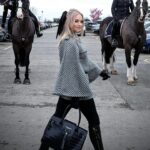 Kimberly Wyatt Instagram - Immersed in the captivating world of the Cheltenham Festival, where exquisite fashion, electrifying ambiance, and the sheer brilliance of majestic equine reign supreme! Absolutely adoring my stunning Fairfax and Favor Sienna houndstooth cape, paired with the most incredible quality @fairfaxandfavor boots and gorgeous navy handbag. It’s a pleasure representing such a fabulous fashion brand amidst the magic of Cheltenham! 🐎✨ #CheltenhamMagic #EquestrianElegance #FairfaxandFavorFashion #ad