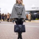 Kimberly Wyatt Instagram - Immersed in the captivating world of the Cheltenham Festival, where exquisite fashion, electrifying ambiance, and the sheer brilliance of majestic equine reign supreme! Absolutely adoring my stunning Fairfax and Favor Sienna houndstooth cape, paired with the most incredible quality @fairfaxandfavor boots and gorgeous navy handbag. It’s a pleasure representing such a fabulous fashion brand amidst the magic of Cheltenham! 🐎✨ #CheltenhamMagic #EquestrianElegance #FairfaxandFavorFashion #ad