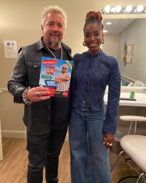 Kirby Instagram - A most legendary Triple D… Dope Dude and Denim.👖🤘🏾🤩🎸🍔👖💛🌮🎸🤟🏿💙🍕
Canadian Tux, styled by yours truly👖(… btw, the jeans were thrifted and the jacket was given to me by mum… to whom @guyfieri gave and signed the book 🥹)
Makeup by @brandyallen 
Hair by @hairjunkierandy
Faux Locs by @e_scizorhands 
#LateLateShow
#flavortown