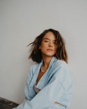 Kristína Svarinská Instagram - Caption:

Grounded in her real world.

📸 @katarinaslesar 
👗 @who.is.laska 
💅🏻 @makeupbykatka 

#photoshoot #havingfun #denimonskin #messyhair #takemeanywhere #catchmeifucan #playinbymyownrules