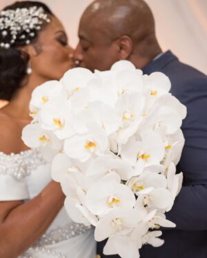Kron Moore Instagram - So… we did a thang.👰🏾‍♀️🤵🏿‍♂️💍💜

Hair: @designer_elijah_ 
Unit: @kenya_styles 
MUA: @itsparasharde 
Skin: @luminousskinatl 
Gowns: @bridesbynona 
Shoes: @jimmychoo 
@geminiair14 ‘s MUA: @rachelreid.beauty 
@geminiair14 ’s  Hair: @kimberlythecreatork 
@geminiair14 ‘s Custom Tux: @beeombi 
@geminiair14 ‘s Shoes: @giuseppezanotti 
Coordinator: @_eventsbymesita 
Venue: @legendaryevents 
DJ: @liftoff__ 
Entertainment: @shaunrose_ 
Photography: @taunhendersonphotography 

#kronmoore #love #wedding #life #summer #atl #vowrenewalceremony