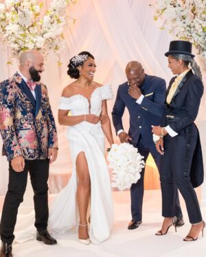 Kron Moore Instagram - So… we did a thang.👰🏾‍♀️🤵🏿‍♂️💍💜

Hair: @designer_elijah_ 
Unit: @kenya_styles 
MUA: @itsparasharde 
Skin: @luminousskinatl 
Gowns: @bridesbynona 
Shoes: @jimmychoo 
@geminiair14 ‘s MUA: @rachelreid.beauty 
@geminiair14 ’s  Hair: @kimberlythecreatork 
@geminiair14 ‘s Custom Tux: @beeombi 
@geminiair14 ‘s Shoes: @giuseppezanotti 
Coordinator: @_eventsbymesita 
Venue: @legendaryevents 
DJ: @liftoff__ 
Entertainment: @shaunrose_ 
Photography: @taunhendersonphotography 

#kronmoore #love #wedding #life #summer #atl #vowrenewalceremony