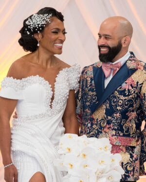 Kron Moore Instagram - So… we did a thang.👰🏾‍♀️🤵🏿‍♂️💍💜

Hair: @designer_elijah_ 
Unit: @kenya_styles 
MUA: @itsparasharde 
Skin: @luminousskinatl 
Gowns: @bridesbynona 
Shoes: @jimmychoo 
@geminiair14 ‘s MUA: @rachelreid.beauty 
@geminiair14 ’s  Hair: @kimberlythecreatork 
@geminiair14 ‘s Custom Tux: @beeombi 
@geminiair14 ‘s Shoes: @giuseppezanotti 
Coordinator: @_eventsbymesita 
Venue: @legendaryevents 
DJ: @liftoff__ 
Entertainment: @shaunrose_ 
Photography: @taunhendersonphotography 

#kronmoore #love #wedding #life #summer #atl #vowrenewalceremony