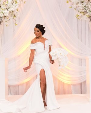 Kron Moore Instagram - So… we did a thang.👰🏾‍♀️🤵🏿‍♂️💍💜

Hair: @designer_elijah_ 
Unit: @kenya_styles 
MUA: @itsparasharde 
Skin: @luminousskinatl 
Gowns: @bridesbynona 
Shoes: @jimmychoo 
@geminiair14 ‘s MUA: @rachelreid.beauty 
@geminiair14 ’s  Hair: @kimberlythecreatork 
@geminiair14 ‘s Custom Tux: @beeombi 
@geminiair14 ‘s Shoes: @giuseppezanotti 
Coordinator: @_eventsbymesita 
Venue: @legendaryevents 
DJ: @liftoff__ 
Entertainment: @shaunrose_ 
Photography: @taunhendersonphotography 

#kronmoore #love #wedding #life #summer #atl #vowrenewalceremony