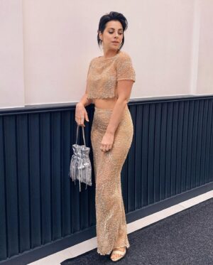 Krysta Rodriguez Instagram - I’m all aglow after last night’s @paradebway opening. So honored I got to celebrate this show and that I get to share life with geniuses like @michaelarden ✨

👗: @frederickanderson_designer
👡: @louboutinworld
💎: @whitespacejewelry
👜: @rodosince1956 
💇🏻‍♀️: @tommy_buckett
💄: @katnejatbeauty
Styling: @sarahslutsky
Asst @carlee___ 

Photo #1: the incomparable @jennyandersonphoto