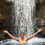 Kubbra Sait Instagram - 🎶 Let’s start with singing, “la la la laaaaa la la la la… lah lah lah!” 🎶 A little break taken into the wilderness of #IncredibleIndia This waterfall is remotely located deep into the forests and wilderness of the Gharwal region of Uttarakhand. We hiked about an hour & a bit, crossed a massive bridge in order to reach this little nest. I must admit… We were the only ripped people there… 😛 the other people were two friends who make Maggi and chai and also have now put up a rope to assist travelers to soak into the waterfall. I mean yah… (I am mixed about the maggi wala being there)… but, if not for the rope I would’ve easily chipped a tooth or something… and then… who would’ve done the iconic Liril shoot? Huh!?!?! When we got here (admittedly late) which made us take the beating of the Sun 🌞 we got maybe a teeny tiny head rush but no tan 😉 Our country is soooo beautiful and it turns out to be even more pretty when you can find a moment to get out of your own head and only look around with the eyes of your heart. ♥️ As always and forever @aquaterraadventures Thanks for suggesting this walk and immersion into crisp turquoise waters. I love you deeply and entirely. A massive shout out to Tanya and Harinder who walked the walk and then also shot real cute videos making this a trip to remember. #india #happiness #joy #love #laugh #live #adventure #waterfall #uttarakhand #gharwal #mountains Will you go searching for this jewel in the rocks?