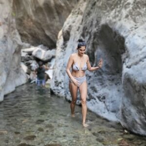 Kubbra Sait Instagram - 🎶 Let’s start with singing, “la la la laaaaa la la la la… lah lah lah!” 🎶 A little break taken into the wilderness of #IncredibleIndia This waterfall is remotely located deep into the forests and wilderness of the Gharwal region of Uttarakhand. We hiked about an hour & a bit, crossed a massive bridge in order to reach this little nest. I must admit… We were the only ripped people there… 😛 the other people were two friends who make Maggi and chai and also have now put up a rope to assist travelers to soak into the waterfall. I mean yah… (I am mixed about the maggi wala being there)… but, if not for the rope I would’ve easily chipped a tooth or something… and then… who would’ve done the iconic Liril shoot? Huh!?!?! When we got here (admittedly late) which made us take the beating of the Sun 🌞 we got maybe a teeny tiny head rush but no tan 😉 Our country is soooo beautiful and it turns out to be even more pretty when you can find a moment to get out of your own head and only look around with the eyes of your heart. ♥️ As always and forever @aquaterraadventures Thanks for suggesting this walk and immersion into crisp turquoise waters. I love you deeply and entirely. A massive shout out to Tanya and Harinder who walked the walk and then also shot real cute videos making this a trip to remember. #india #happiness #joy #love #laugh #live #adventure #waterfall #uttarakhand #gharwal #mountains Will you go searching for this jewel in the rocks?