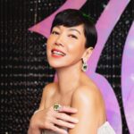 Kym Ng Instagram – Yes, it’s Peridot （橄榄石）that I am wearing ❣️
From Mogok, Myanmar, these very precious and beautiful gemstones are unheated and untreated, and, I so very much love the vibrant green hue 💕 
Besides being very rare, Peridots are also associated with positive energy! Perhaps it was this positive energy from the exquisite earrings and ring that gave me the luck I needed for last Sunday night. Could you feel the good vibes watching me on the red carpet? 😜 Thank you @yadanargems , for glamming me up on Star Awards 2024!