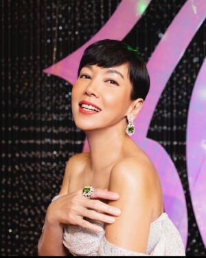 Kym Ng Instagram - Yes, it’s Peridot （橄榄石）that I am wearing ❣️
From Mogok, Myanmar, these very precious and beautiful gemstones are unheated and untreated, and, I so very much love the vibrant green hue 💕 
Besides being very rare, Peridots are also associated with positive energy! Perhaps it was this positive energy from the exquisite earrings and ring that gave me the luck I needed for last Sunday night. Could you feel the good vibes watching me on the red carpet? 😜 Thank you @yadanargems , for glamming me up on Star Awards 2024!