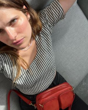 Lake Bell Instagram - The least I can do is find my light. 

Top&bag @marlowgoodskate