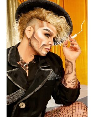 Landon Cider Instagram - Smoke ‘em if you got ‘em!
🚬 by tampon 
📸 by @munachiosegbu for @billboard 
Blazer by @simplyfontasia * shirt by @orttu_official * hair from @wigsbyvanity * jewelry from @vitaly * edits by @stevenhgarcia 
.
Close out our “Diverse” year with special guest @kornbreadthesnack who joins our cast of Kings THIS Sat. Dec 9th at @hamburgermaryslb!
.
Plus a hand-crafted sneaky sneak cause I can’t post “look at me in my cross dresser outfit” photos without using the opportunity to share some thoughts. This is the only platform I use regularly so this where I post. 
Don’t like it? Don’t care. 🤷‍♂️