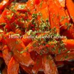Lanisha Cole Instagram - Honey garlic glazed carrots 🥕✨🤌🏾 Such a tasty side dish! . We had an extra bag of carrots from our last shopping trip. I wanted to make something sweet and came up with a recipe for these glazed carrots. All you need is: ✅ one bag of carrots ✅ peeled garlic ✅ fresh ginger ✅ honey ✅ brown sugar ✅ vanilla ✅ balsamic vinegar ✅ thyme ✅ salt ✅ dried or fresh parsley ✅ butter ✅ olive oil . Chop up your carrots, garlic and ginger. In a frying pan, add some butter and olive oil. Next add your carrots and a splash of water and cook for a few minutes to soften them up. . Next add the brown sugar, vanilla, nutmeg, garlic, balsamic vinegar, ginger, and honey. Stir in a sprinkle of thyme and salt. . Let it simmer on medium heat for about 10 minutes or until the sugar becomes caramelized. Add to a plate and top with some chopped fresh or dried parsley. . I don’t measure the ingredients so it’s all up to you and your taste preference! . This side dish is so easy to make and tastes amazing 🤌🏾✨ Enjoy! . . #glazed #glazedcarrots #honeygarlic #honeyglazed #balsamicvinegar #carrots #sidedish #homecooking #homecooked #easymeals #easymealideas #mealprepideas #dinnerrecipes #foodie #deliciousrecipes #momlife #simplerecipes #simplemeals