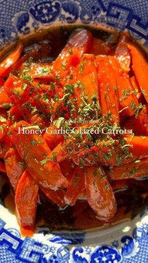 Lanisha Cole Instagram - Honey garlic glazed carrots 🥕✨🤌🏾 Such a tasty side dish!
.
We had an extra bag of carrots from our last shopping trip. I wanted to make something sweet and came up with a recipe for these glazed carrots. All you need is:
✅ one bag of carrots 
✅ peeled garlic 
✅ fresh ginger 
✅ honey 
✅ brown sugar 
✅ vanilla 
✅ balsamic vinegar 
✅ thyme 
✅ salt
✅ dried or fresh parsley 
✅ butter 
✅ olive oil 
.
Chop up your carrots, garlic and ginger. In a frying pan, add some butter and olive oil. Next add your carrots and a splash of water and cook for a few minutes to soften them up. 
.
Next add the brown sugar, vanilla, nutmeg, garlic, balsamic vinegar, ginger, and honey. Stir in a sprinkle of thyme and salt.
.
Let it simmer on medium heat for about 10 minutes or until the sugar becomes caramelized. Add to a plate and top with some chopped fresh or dried parsley. 
.
I don’t measure the ingredients so it’s all up to you and your taste preference! 
.
This side dish is so easy to make and tastes amazing 🤌🏾✨ Enjoy! 
.
.
#glazed #glazedcarrots #honeygarlic 
#honeyglazed #balsamicvinegar  #carrots #sidedish #homecooking #homecooked #easymeals #easymealideas #mealprepideas #dinnerrecipes #foodie #deliciousrecipes #momlife #simplerecipes #simplemeals