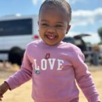 Lanisha Cole Instagram - Her smile is everything 🥹❤️✨🙌🏾 . Onyx went on her first #breastcancerawareness walk with Grandma yesterday 💕 . #breastcancerawarenessmonth #underwoodfamilyfarms #onyxice #coleandkuba #pumpkinpatch #halloweenweekend