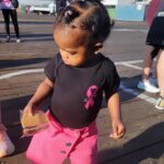 Lanisha Cole Instagram - Her smile is everything 🥹❤️✨🙌🏾 . Onyx went on her first #breastcancerawareness walk with Grandma yesterday 💕 . #breastcancerawarenessmonth #underwoodfamilyfarms #onyxice #coleandkuba #pumpkinpatch #halloweenweekend