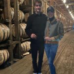 Lara Spencer Instagram - 10 shots (pun intended) of our Mother Son tour of Jack Daniel's Distillery. A fabulous history lesson and look at how this iconic American brand takes such pride in their product. Did you know every drop of Jack around the world is made right here in Lynchburg, TN? Handcrafted right down to the labels-- applied by HAND (see the video attached--I kept thinking of Lucy and the chocolates!). What a highlight to do a tasting with the Master Distiller and true rockstar Chris Fletcher and go up to the top floor of a very special barrel house, watch him DRILL into a barrel of 4 year old Tennessee Whiskey, and allow us to fill a bottle and taste. Learned so much. Laughed so much. Hopefully our boys will smile and remember our day every time they see a bottle of Jack. #oldnumber7 .