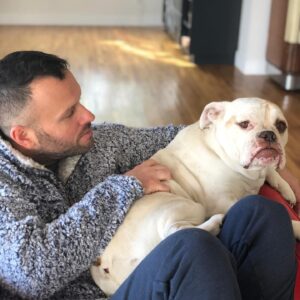 Laura Bell Bundy Instagram - Today we said goodbye to our beloved bulldog Polly. Most bulldogs don’t jump fences and live till they’re 14, but Polly did. She had the spirit of a puppy her whole life, spry, energetic, loving. She had some real FOMO and never wanted to miss an opportunity to socialize or meet a new human she could love on.  She LOVED people. She’d try to sleep on my face sometimes.  She could do paw and kiss on command. She was such a good listener.  She was such a pretty pup. That FACE! When Thom and I met, she was there, when we married, when we had Huck, she was there . Huck’s first word was ‘Dog’ bc he loved Polly.  Polly has always been there. It’s going to feel so empty without her.  She will always be missed and always in my heart. I love you Polly Wally doodle. 💔 #puppylove