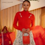 Laura Haddock Instagram - Painting Camber Sands red with @longchamp celebrating the launch of their spring/summer ‘23 collection. #LongchampGlamping #LongchampSS23