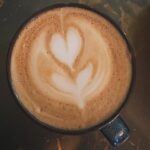 Laura Vandervoort Instagram - Pictured here, two very important things. Swipe Right. 1) Coffee 2) Frankie @frankie_blueeyes That is all. Thank you. 💕