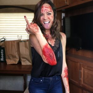 Laura Vandervoort Instagram - My happy place on set. And for whatever reason, often covered in blood. 

📸 by @biancajmusic (now I need to find the video I took of you dressed up on the mini tricycle 😂)