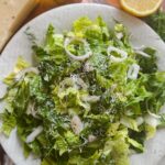 Laura Vitale Instagram - Probably the thing I make the most in my every day life and I know it looks wildly simple (and it is and I don’t apologize for it) it’s so good, you’ll want to make it every single day for the rest of your life. It’s my go to salad to accompany anything, start any meal or mid meal (which I prefer) the magic that is the dill, shallots, capers and strong evoo is just other worldly. Make it, you’ll love it!