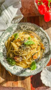 Laura Vitale Instagram - Comment BOOK (no character after the word or it won’t work) and I’ll send you the link directly to make it easier for you (yall really love this feature and I’m so happy❤️❤️❤️❤️) this recipe is such a star and requires very few ingredients but cooked just right creates absolute magic!!! Sitting here eating a bowl of this spaghetti alla nerano-ish transports me to warm summer days sitting at my favorite place in the magic that is Italy and just the thought of that makes life better ❤️ ingredients below, full recipe /instructions and inspo to live your very best life is found At My Italian Table ❤️❤️ 1/2 cup extra virgin olive oil 1 garlic clove 1.5lb small zucchini thinly sliced 1/4 cup of grated parm 1/4 cup of grated pecorino Few basil leaves Salt to taste and plenty of black pepper if you’d like!