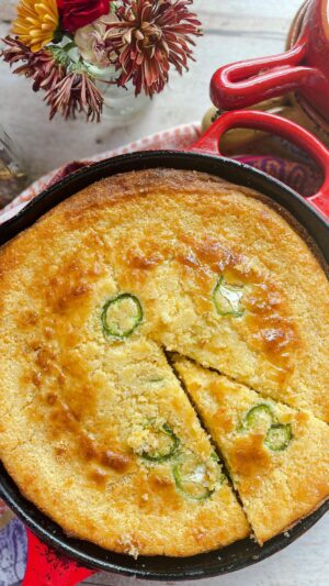 Laura Vitale Instagram - I’m no southerner (which I know make the best cornbread) but I do know good food or at least, I think I do 😝 but you’re going to have to trust me when I tell you this jalapeño cheddar cornbread is a must with your chilis (more on that tomorrow!) and stews all fall and winter long. Its darn easy too, maybe too easy? Coated in butter and a drizzle of honey while it’s still hot and sizzling so they honey and butter slowly drip into the cornbread and omgggg you’re just not at all ready!! The cornbread recipe is the same one I shared like 10 years ago (do we need an in-depth redo???) and I added cheddar and jalapeños to it and cooked it the same way. If you’re not cooking your cornbread in a hot greased cast iron than what are you doing?? Cornbread recipe on my site and linked in stories!