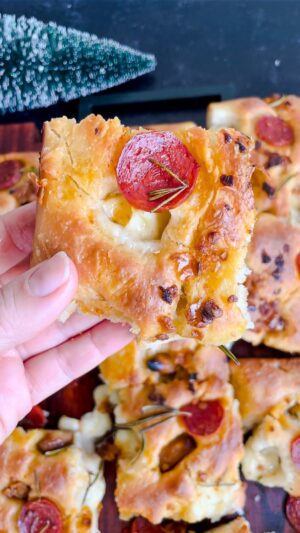 Laura Vitale Instagram - You need a good bread basket at your holiday meal, I mean it’s a given. I’ve made this roasted garlic and mozzarella spicy focaccia a few years in a row and let me tell youuuuuuuu, it does NOT disappoint! I’ll link the recipe in bio, but trust meeee, it’s out of this world!!