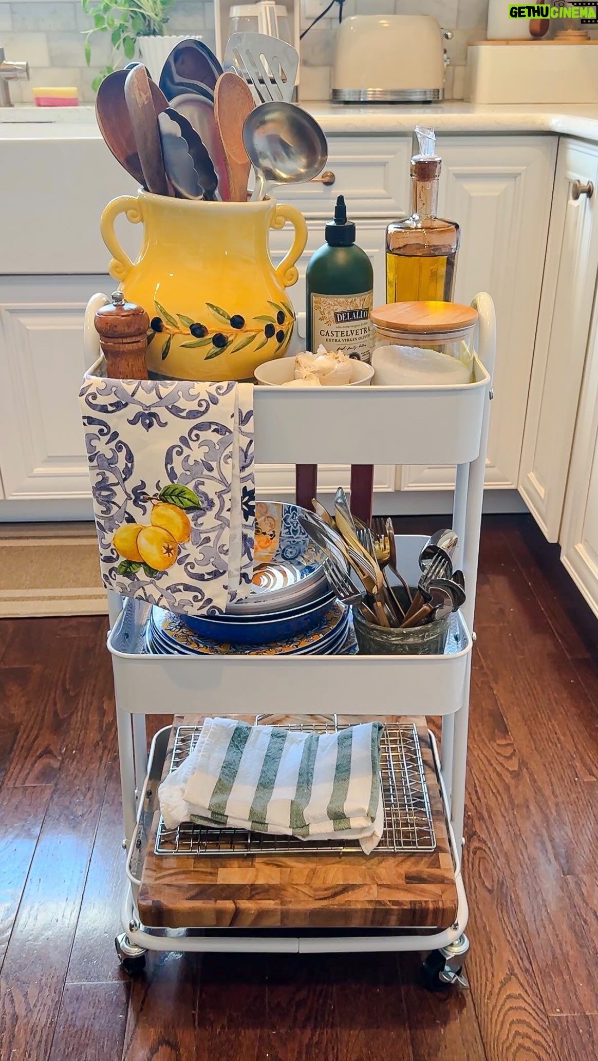 Laura Vitale Instagram - Buongiorno!! Set up my outdoor cooking cart with me! I think of this little cart like the countertop in my kitchen, it holds all the little things I would constantly run back and fourth in the kitchen for, this way it’s all in one place, I roll it wherever I need it, and it holds my essentials (just like my countertop in the kitchen) pots and pans I grab what I need for what I’m cooking but other than that, this little cart holds my basics I use all day every day for pretty much everything I cook. I always need some plates and shallow bowls either for prepped ingredients or to place things in, silverware to grab and go and everything else I need at the ready! Do you this too? It saves me with all the cooking I do outside because otherwise I’d lose my mind 🤣 I’ll link my cart in stories for you (the utensil holder is an old Italian cookie jar but I linked similar versions for you and all saved to kitchen things highlights) ❤️