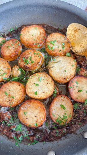Laura Vitale Instagram - Buongiorno! Here’s the thing, potatoes for me are their own food group and I’m pretty sure I’ve never had a potato dish I didn’t like😂 these melting potatoes are simply sensational!! Cut the potatoes into thick disks, Pat them dry really well the heavily salt and pepper them and sear them in a mix of olive oil and butter. Once seated on both sides, add some cracked garlic cloves and some rosemary (or thyme) along with enough stock to come about half way up the potato and throw them in a 400 degree oven until cooked through, should only take 15 min. They are simply divine!! #lvturkeyday2023 

#food #foodporn #foodie #instafood #foodphotography #foodstagram #yummy #foodblogger #foodlover #instagood #love #delicious  #homemade #dinner #foodgasm #tasty #photooftheday #foodies  #cooking  #picoftheday #foodpics #instagram #fall #fallfood #thanksgiving #thanksgivingfood #recipe #recipes #easyrecipes