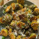 Laura Vitale Instagram - Caio e pepe Brussel sprouts is pretty much the only way I want to eat them right now. So crunchy, salty and peppery, literally the best thing you can make with them and i promise you, even the pickiest eaters will give these a try! I simply toss brussel sprouts with olive oil, salt, pepper and some garlic and herb seasoning, place them cut side down on a baking sheet liner with parchment and generously covered in freshly grated parm, pop them in the oven at 400 for 20ish min and when they come out, peel them from the baking sheet, dowse with more parm and oh so much pepper! So so good! #LVturkeyday2023 #food #foodporn #foodie #instafood #foodphotography #foodstagram #yummy #foodblogger #foodlover #instagood #love #delicious #homemade #dinner #foodgasm #tasty #photooftheday #foodies #cooking #picoftheday #foodpics #instagram #fall #fallfood #thanksgiving #thanksgivingfood #recipe #recipes #easyrecipes