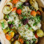 Laura Vitale Instagram - Buongiorno! It feels so good to start a new week on the right foot! I couldn’t wait to share this 15 minute baked fish (I call it Italian baked fish) because it’s so so good and perfect for a busy weeknight. Add it all to a small roasting pan (adjust the amounts to fit your needs and I used cod here but any firm fish or even large shelled shrimp will work) in a 400 degree oven for 10 min and broil for 2. I served mine with linguini and tossed some of that sauce with them and it’s so good!! I also added a couple tbsp of white wine to the mix but forgot to take a clip of that 🤦🏻‍♀️ anyway, make it, it’s delish! 2 filets of cod Handful of cherry tomatoes Handful of black olives 1 tbsp of capers Garlic Olive oil 2 tbsp of white wine S,P and oregano Dab of butter Fresh parsley and dill finely chopped