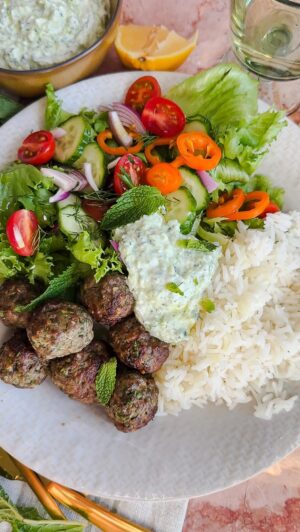 Laura Vitale Instagram - Such a fav dish! Comment MEATBALLS (no character after and re comment with an S if you already wrote meatball since there was a glitch!) and I’ll send you the recipe (trust me you don’t wanna miss it!!) perfect recipe to meal prep and if you’re on an fit journey like myself, these will be a staple because the meatballs and yogurt sauce pack a good amount of protein and the flavor is next level!! Bright and so freaking delicious!!!!