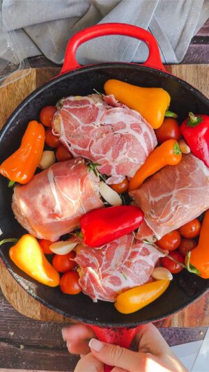 Laura Vitale Instagram - Dinner can be easy peasy if you make this! Season some chicken with some garlic and herb then stuff with a little flavored spreadable cheese situation, wrap it in a prosciutto (I also did 2 pancetta wrapped) blanket, surround with tomatoes, peppers, garlic (I would have added shallots and olives but was out) drizzle with olive oil and bake at 425 for like 40 minutes. Some of the cheese oozes out, mixes with the juicy veg and creates its own sauce. I served mine with angel hair (not a fav of mine but joe loves it) tossed in that sauce with a tbsp of added butter and a handful of cheese and y’all I just about needed to be resuscitated !!!! It was SOOOOOO good!  You must must give it a try!