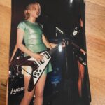 Lauren Laverne Instagram - 18 years old in a PVC dress with a Flying V! Thank you to lovely Chris McCormack who was just sent these pics of a gig my old band Kenickie played with his band 3 Colours Red when we were noisy NE punks… I can’t remember where but I’m assuming Dingwalls in Camden?? Mad times, mostly loads of fun. I think I bought the dress on Holloway Rd from a shop that still seems to be doing well for those who like their frocks wipe clean! #90s