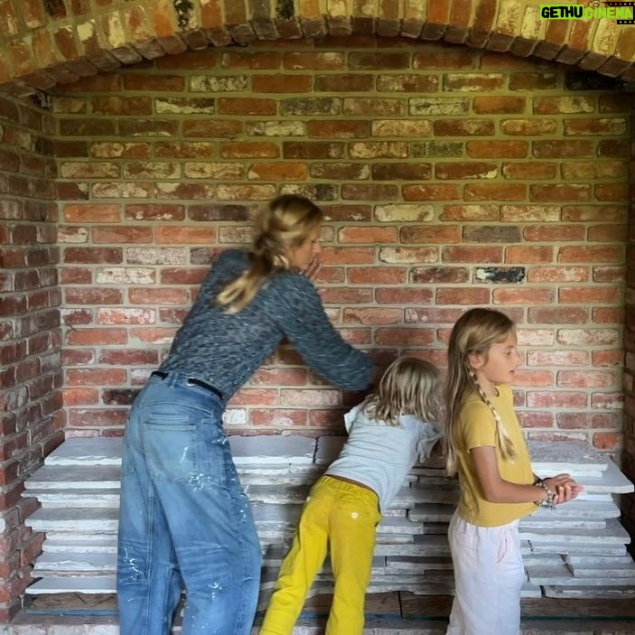 Lauren Liess Instagram - Working on our kitchen fireplace at the Meadow!! We have a chimney from the original wood burning stove alcove (photo 1) that we have moved out (photo 2) to go to the barn studio. I’m SO. PUMPED. to have a true cooking fireplace in the kitchen complete with a swing arm cauldron for our weekly broths/ soups!! While we loved the wood burning stove, a fireplace in front of the kitchen table has been a dream of ours and it will suit the things we like to cook. I’m thinking of keeping the existing niche and doing the fireplace at approximately countertop height (or slightly below so I can easily peek in the cauldron) with a wood niche below. We’re putting a little stone countertop on front for workspace. The brick isn’t suitable for a fireplace interior so it will need another material instead (I’ve been looking at stone, stucco, and terracotta options and will be sharing those in videos soon.) Can’t wait to get this project going! 🔥