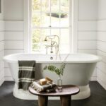 Lauren Liess Instagram - Crisp clean bathroom makeover {swipe to the end for the before where you can see we had a closet -with a window in it!- removed to make room for the tub and to get more natural light in the bathroom} I love fixing floor plans and making things make sense in a house! 🤍 Happy Friday and heads up- most of our LL&Co. apothecary shop is on S A L E up to 50% off right now!! | designed by us | renovation by @carrmichaelconstruction | photos by @helennorman