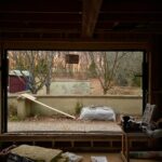 Lauren Liess Instagram - Of all the pictures I post this one might have me the most excited. Our windows are going in at the Meadow!!!! 😆 This is the view out our family room (the old garage) to the front courtyard where I just learned we’ll be seeing beautiful winter sunsets out of 🌅 We’re doing a combination of antique reproduction oak windows modern (with the thinnest reveal possible) windows & doors and it is SO good to see progress!! @otiima_usa @carrmichaelconstruction